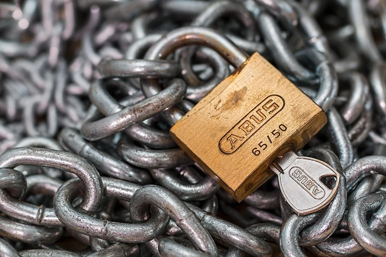 A padlock securing a chain